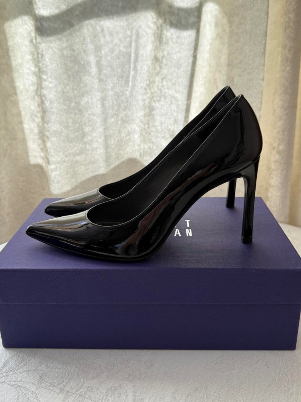 Stuart Weitzman black patent leather pumps